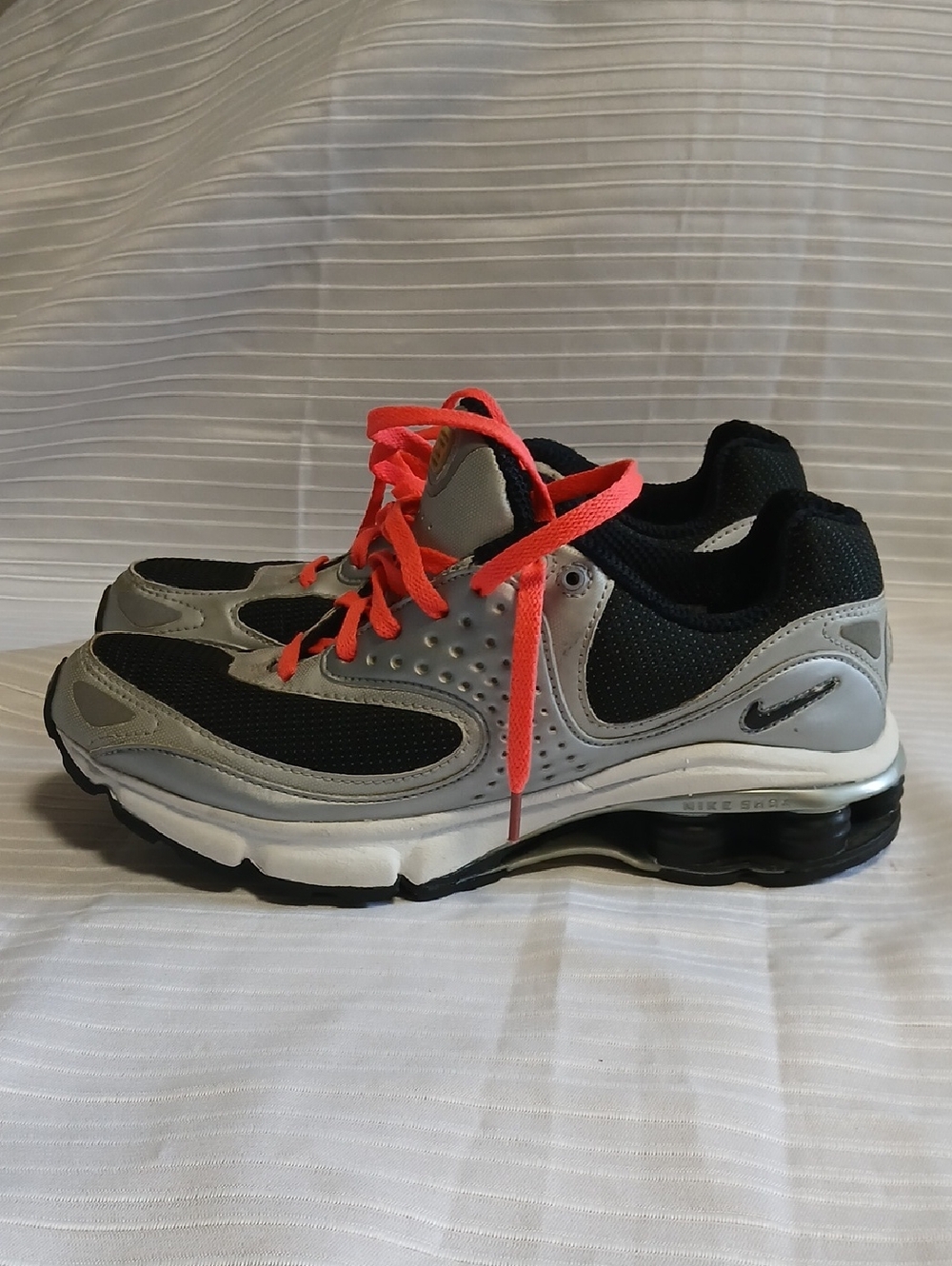 Nike Black and Gray Running Sneakers with Bright Coral Laces